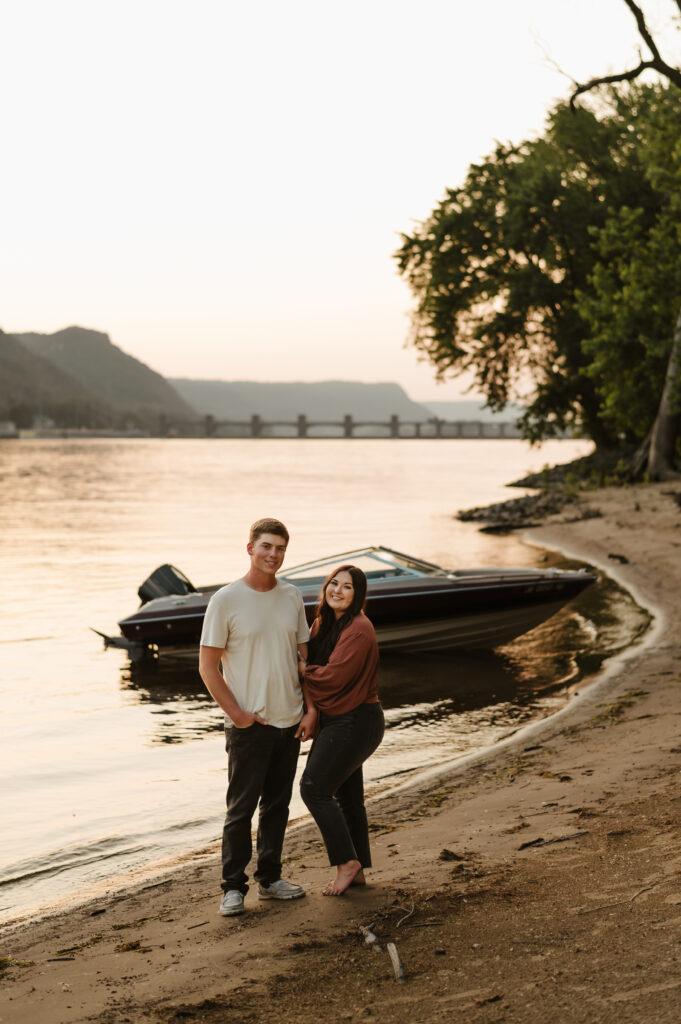 Couples photoshoot on a boat on the mississippi river in La Crosse, wisconsin